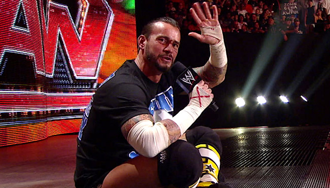 WWE: CM Punk And AJ Lee Punk Fan Who Didn't Even Ask About WWE