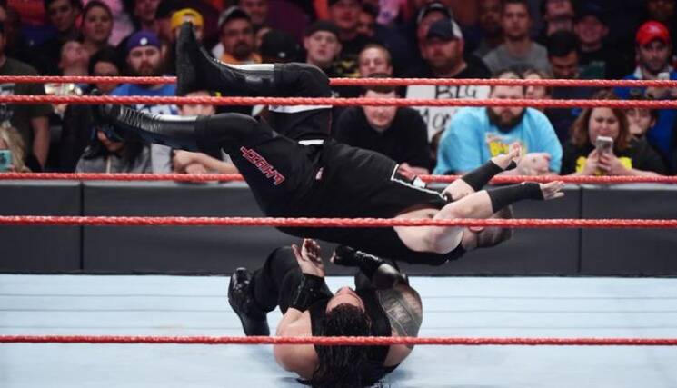 Kevin Owens Roman Reigns Senton