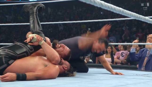 Bron Breakker and Seth Rollins.