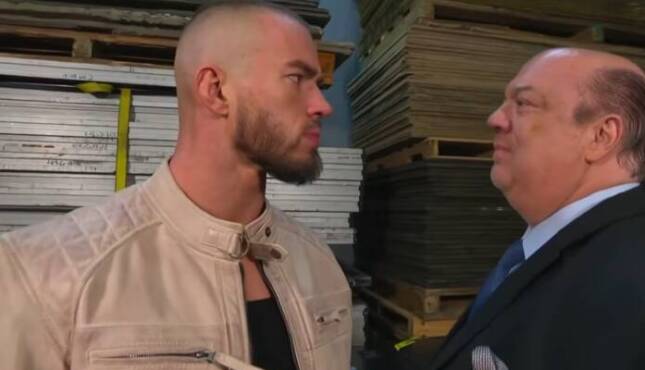 Austin Theory & Paul Heyman.