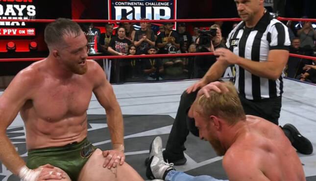 Kyle O'Reilly and Orange Cassidy following their AEW Continental Challenge Match.